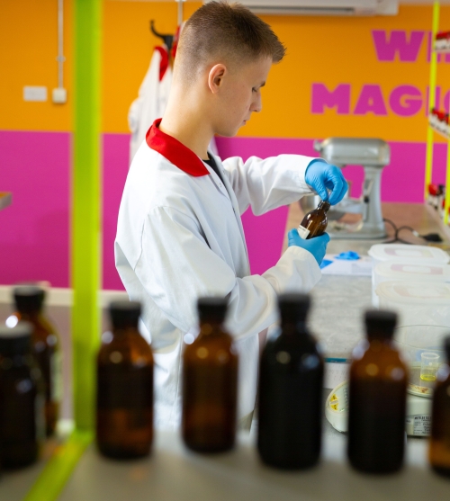 Person in lab working with flavors.